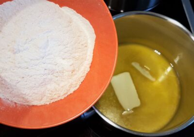 Preparing the bechamel sauce